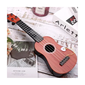 Детска играчка-китара, детска имитативната музикална китара, мини-четырехструнный инструмент, на който може да се играе за ранно образование